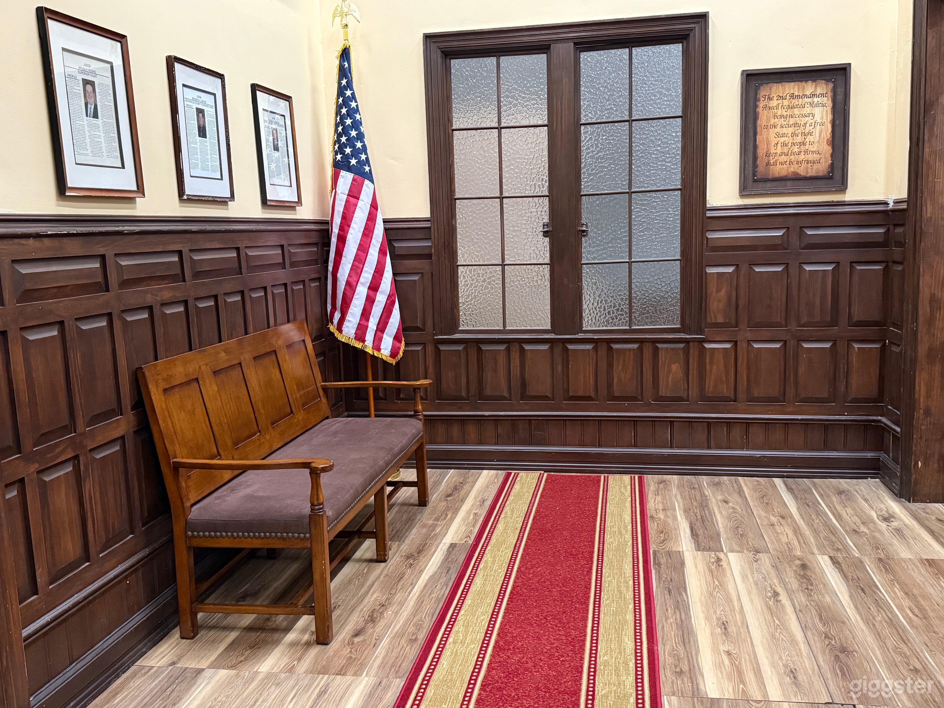 Inside Vertical World Studios - the courthouse set with judge's bench and witness stand